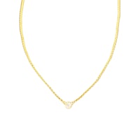 a gold necklace with a small diamond on it